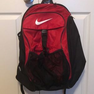 red and black nike backpack